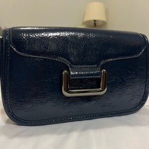 Zara crossbody bag with metallic details.